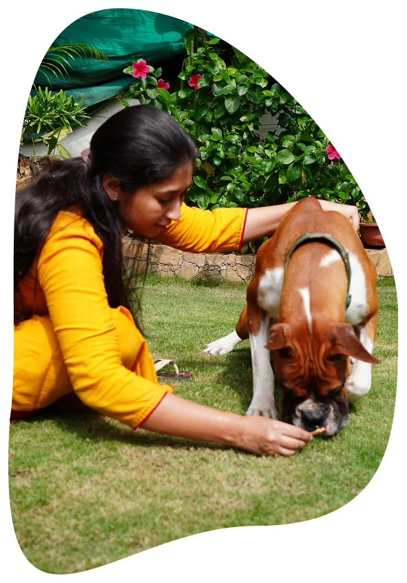Woman playing with her dog
